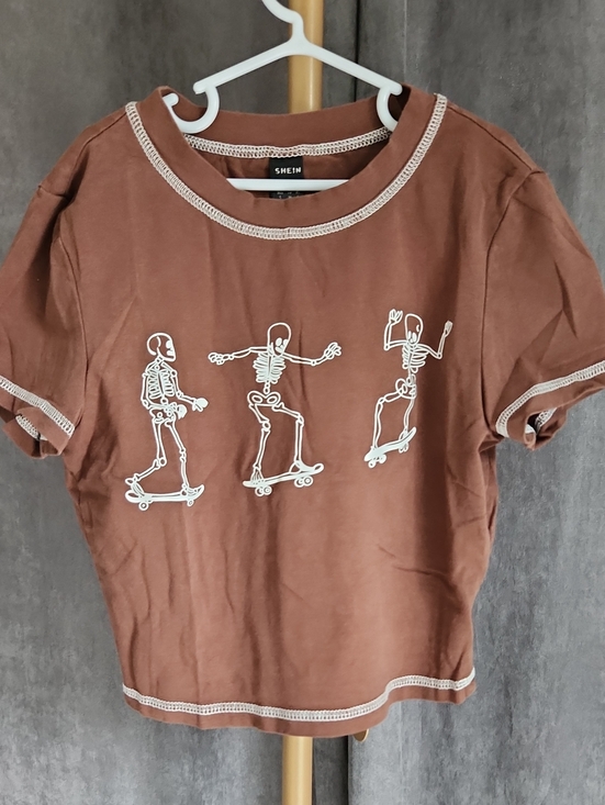 SHEIN Tops - SHEIN Brown Cropped Tee with White Skeleton Skate Graphic